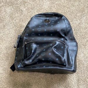 Black leather MCM travel backpack